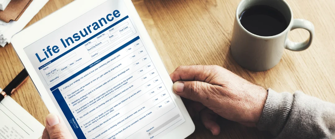 Customer reviewing a life insurance policy with insurance customer support services