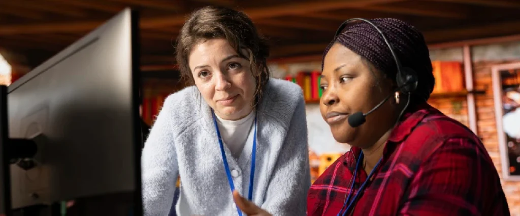 Customer support specialists collaborating to deliver banking and financial services support.