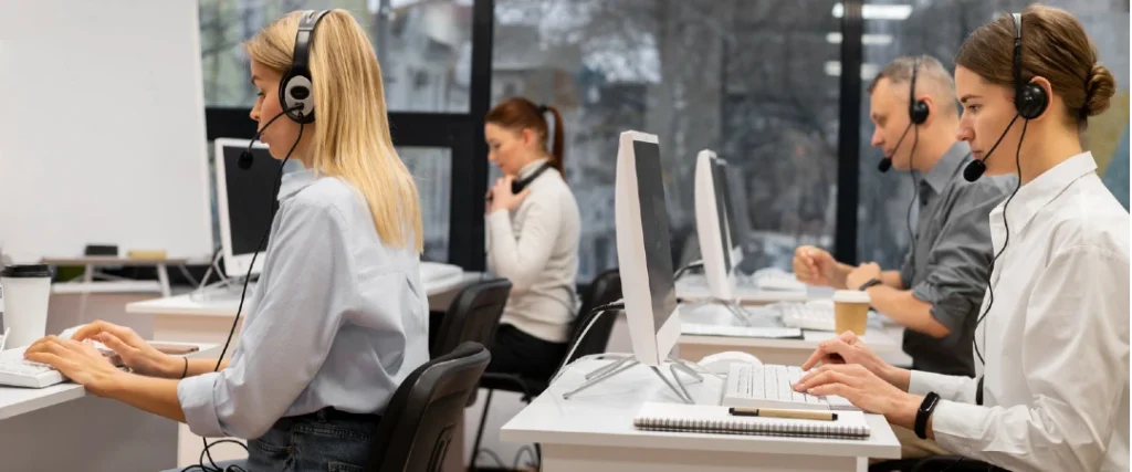 Bilingual call center agents working in a modern office representing the El Salvador BPO workforce